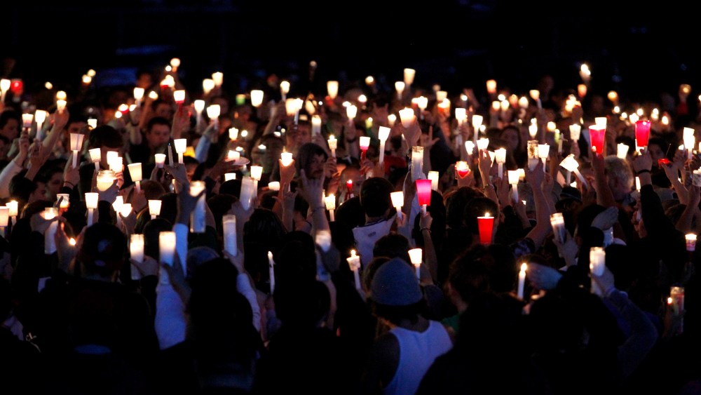 Supporters attend a candlelight vigil after a shooting at Reynolds High School in Troutdale, Oregon