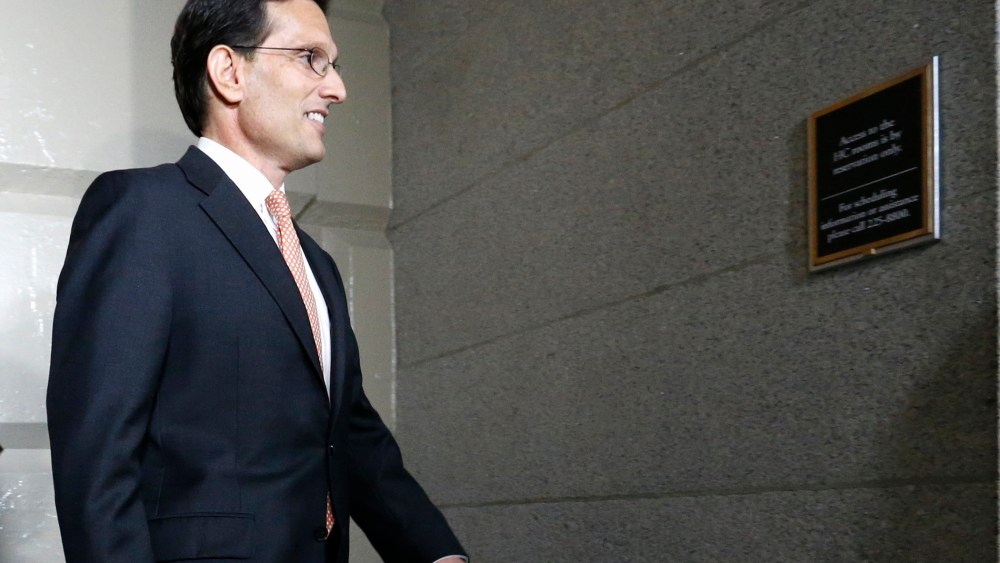 Eric Cantor arrives for a news conference on Capitol Hill in Washington, June 11, 2014.
