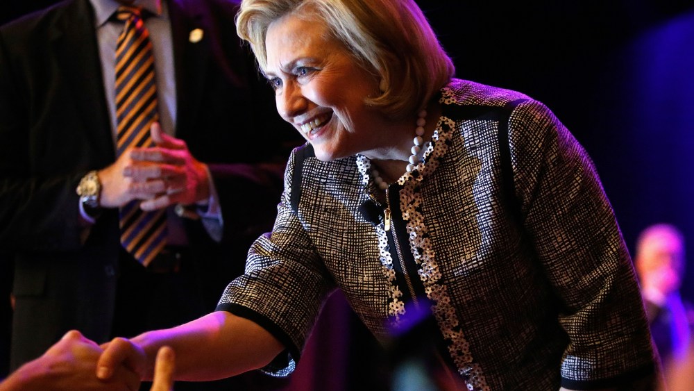 Former U.S. Secretary of State Hillary Clinton greets supporters at George Washington University in Washington on June 13, 2014.