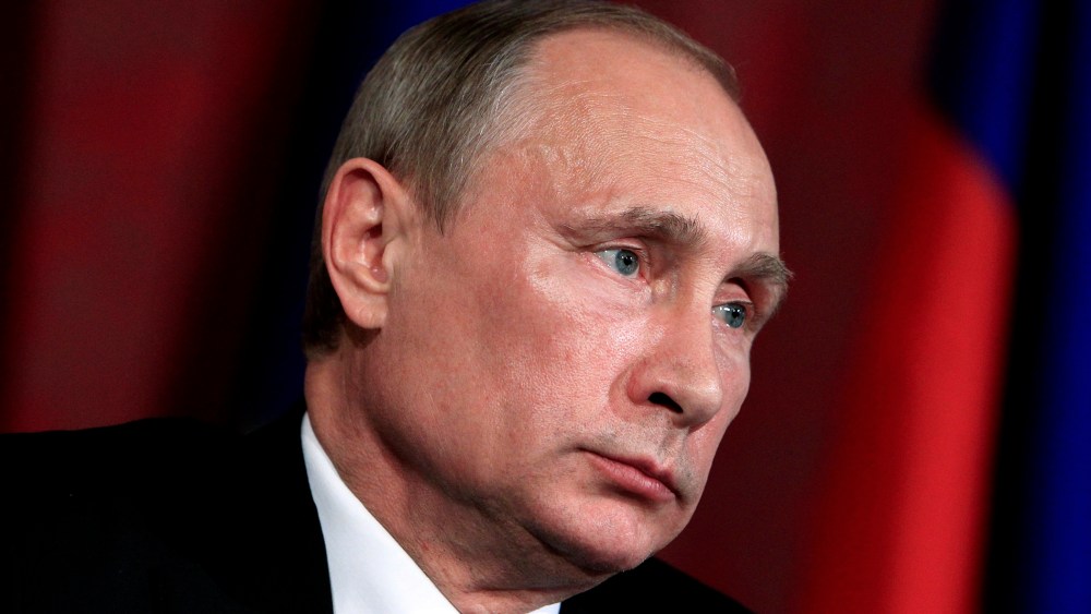 Russia's President Vladimir Putin attends a news conference in Vienna, June 24, 2014.