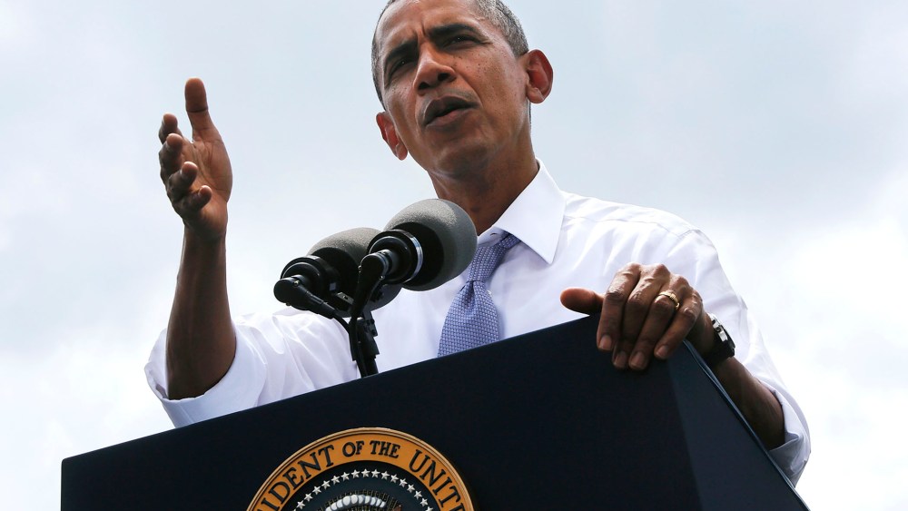 U.S. President Barack Obama delivers remarks at the Georgetown Waterfront Park in Washington, July 1, 2014.