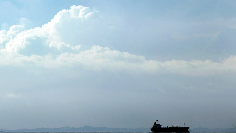 A tanker travels through the Singapore Strait July 6, 2014.