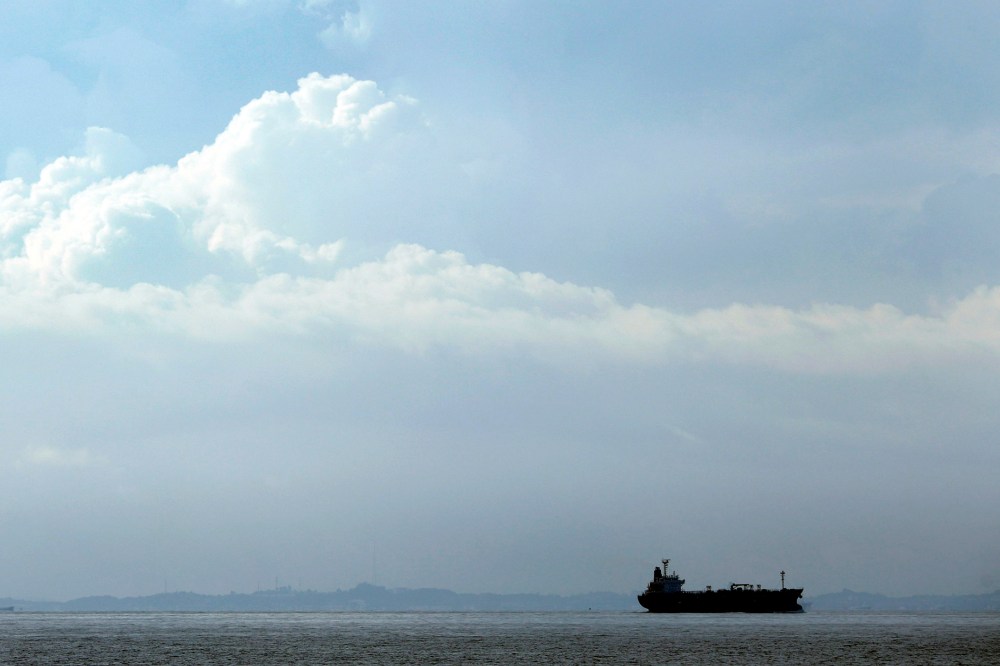 A tanker travels through the Singapore Strait July 6, 2014.