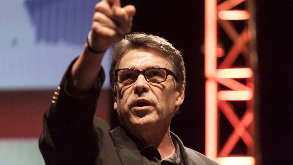 Texas Governor Rick Perry gestures as he speaks at the Family Leadership Summit in Ames, Iowa August 9, 2014.