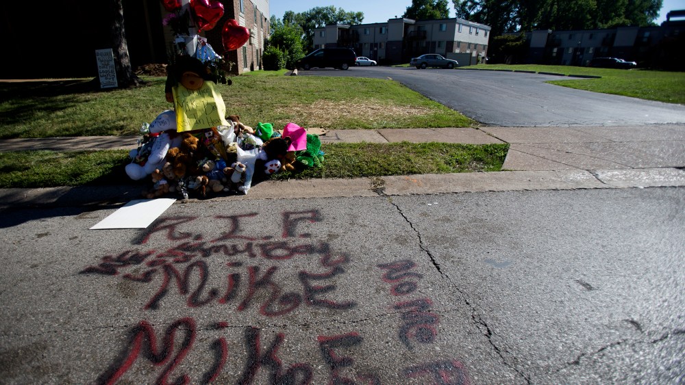 A makeshift memorial is pictured near where Michael Brown was shot to death in Ferguson, Mo., on August 12, 2014.