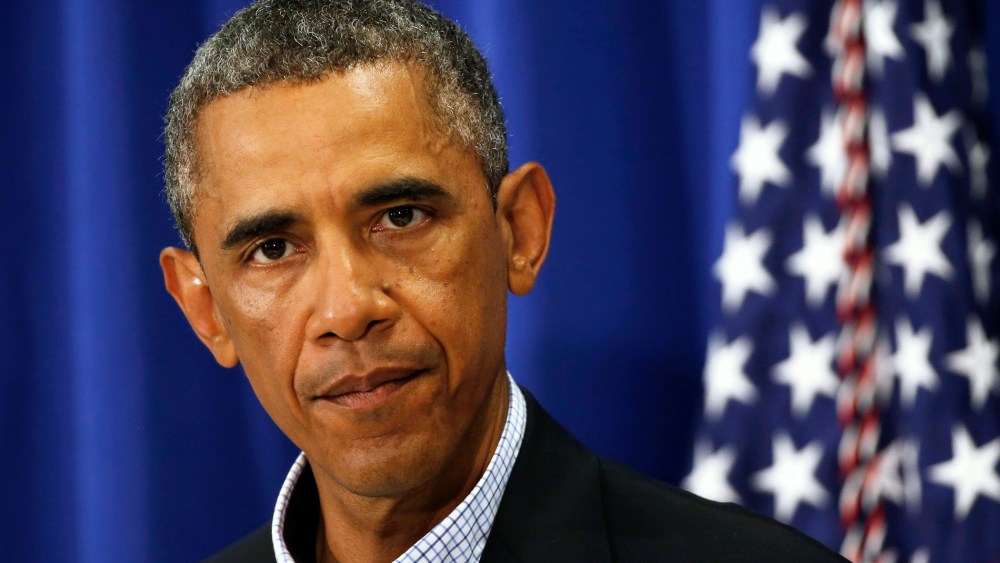 U.S. President Barack Obama speaks about Iraq and also the shooting in Ferguson, Missouri from his vacation on Martha's Vineyard, Massachusetts August 14, 2014.