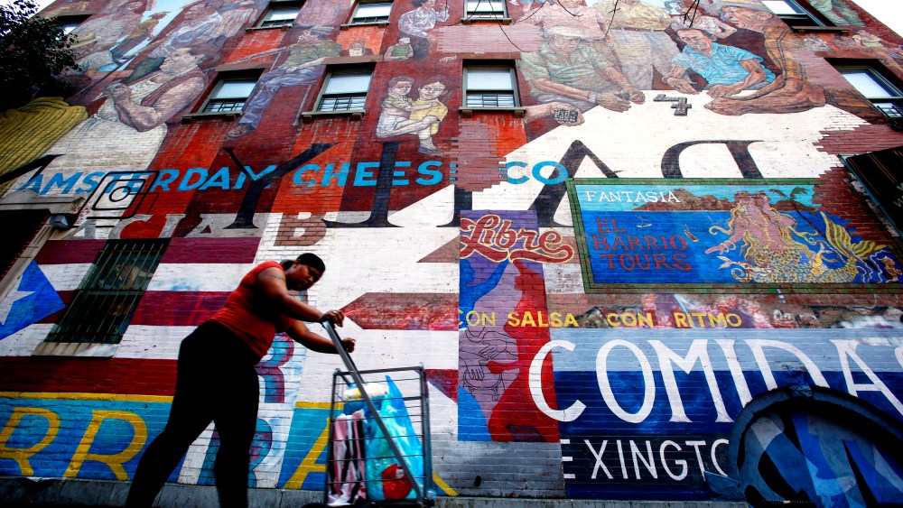 "The Spirit of East Harlem" mural in "EL BARRIO," Harlem, New York Aug. 10, 2014. A bubbling Hispanic cultural stew is brewing in New York, spiced by Latin American newcomers. (Photo by Eduardo Munoz/Reuters)