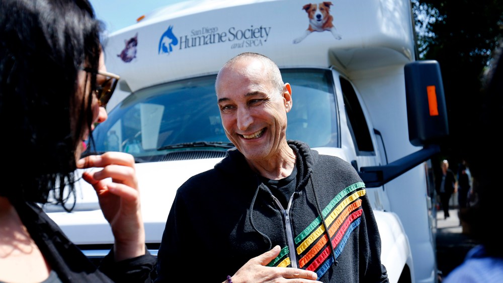 Hollywood mogul and co-creator of The Simpsons, Sam Simon, smiles while visiting a chinchilla farm after he financed the purchase of the facility by PETA in order to rescue over 400 chinchillas in Vista, Calif. Aug. 19, 2014. (Photo by Mike Blake/Reuters)