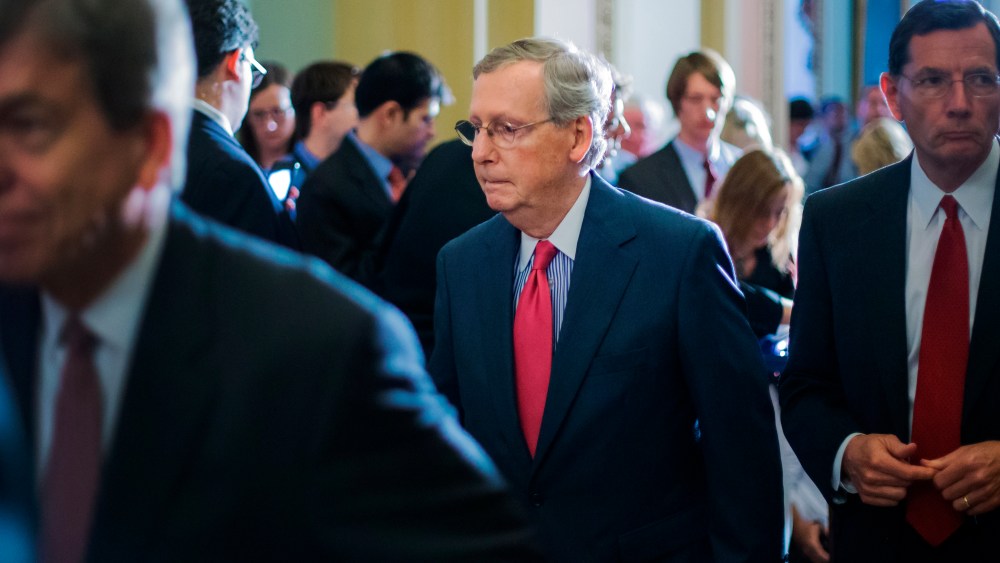 McConnell departs after his news conference following the weekly Republican caucus luncheon at the U.S. Capitol in Washington