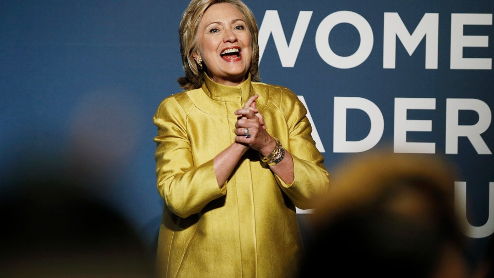 Former U.S. Secretary of State Hillary Clinton arrives to address the Democratic National Committee's Women's Leadership Forum in Washington, Sept. 19, 2014.