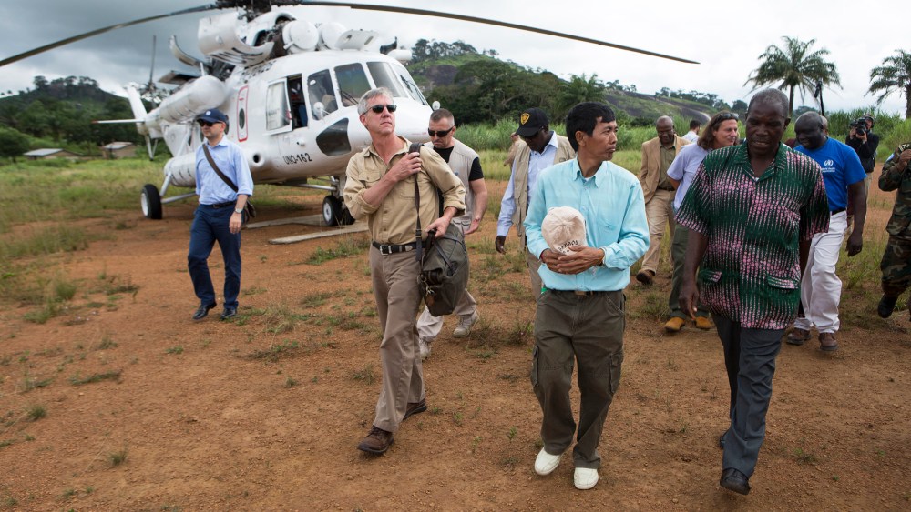 Anthony Banbury (2nd L), Special Representative and Head of the United Nations Mission for Ebola Emergency Response to Liberia, arrives at Foya in Lofa County, October 2, 2014.