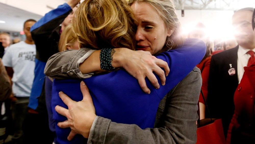 Democratic U.S. Senator Kay Hagan (L) of North Carolina is hugged by a supporter after her concession speech acknowledging her defeat by challenger Thom Tillis at her midterm election night rally in Greensboro, North Carolina on Nov. 4, 2014.