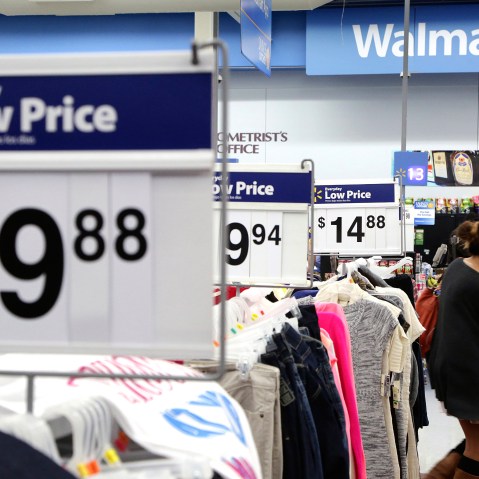 A woman shops at Walmart as the store prepares for Black Friday in Los Angeles, Calif. Nov. 24, 2014. (Photo by Jonathan Alcorn/Reuters)