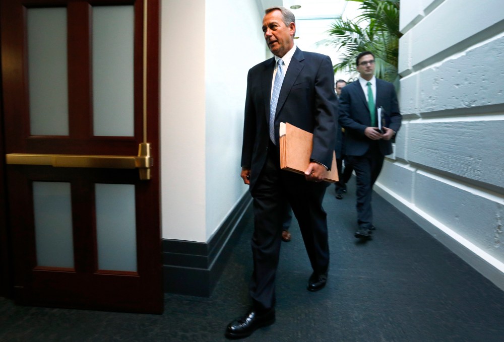 Boehner arrives for a House Republican caucus meeting at the U.S. Capitol in Washington