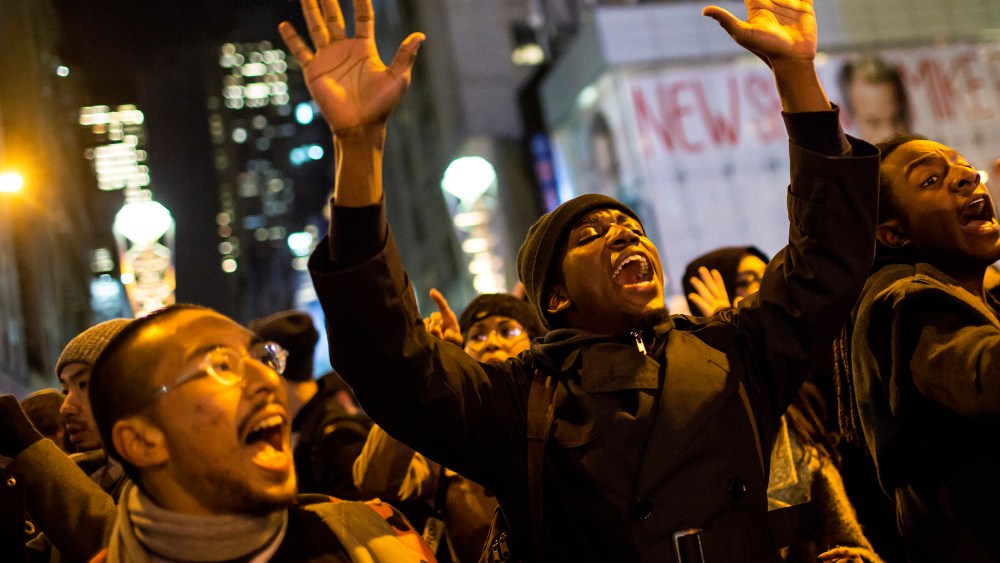 People take part in a protest against the grand jury decision on the death of Eric Garner in midtown Manhattan in New York, N.Y. on Dec. 3, 2014. (Photo by Eric Thayer/Reuters)