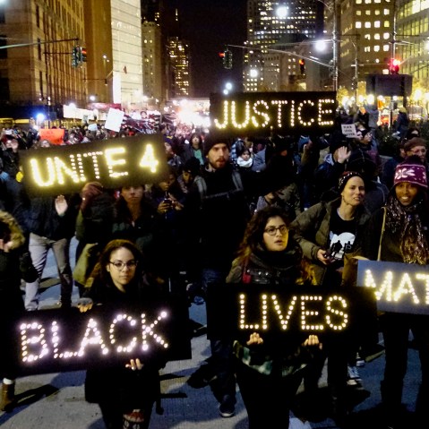 Protesters demonstrate in Lower Manhattan in New York City, demanding justice for the death of Eric Garner, Dec. 4, 2014. (Photo by Eduardo Munoz/Reuters)