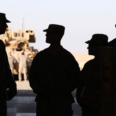 U.S. troops wait for the arrival of U.S. Defense Secretary Chuck Hagel, Dec. 8, 2014. (Photo by Mark Wilson/Reuters)