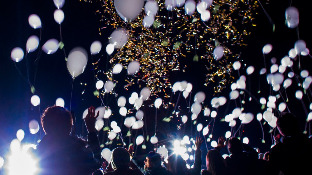 People release balloons during New Year celebrations in Tokyo