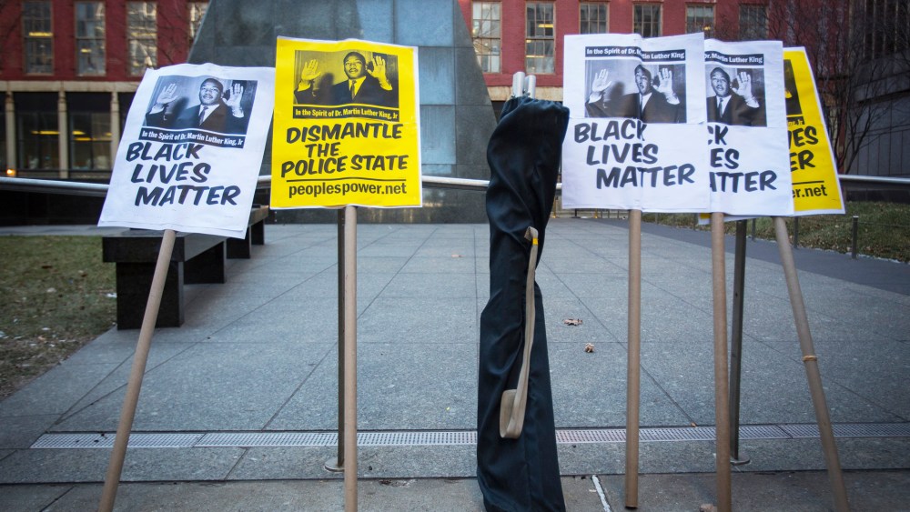 Signs are seen before a protest against police violence towards minorities in New York, N.Y. on Jan. 15, 2015. (Photo by Andrew Kelly/Reuters)