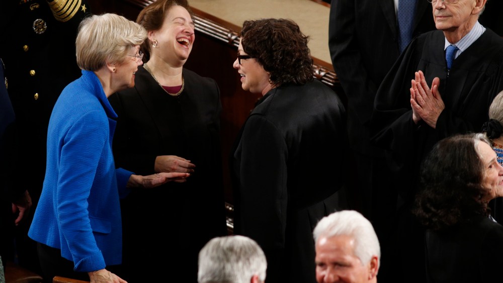 U.S. Senator Warren talks with U.S. Supreme Court Associate Justices Kagan and Sotomayor as Justice Breyer looks on before U.S. President Obama's State of the Union address to a joint session of Congress in the U.S. Capitol in Washington