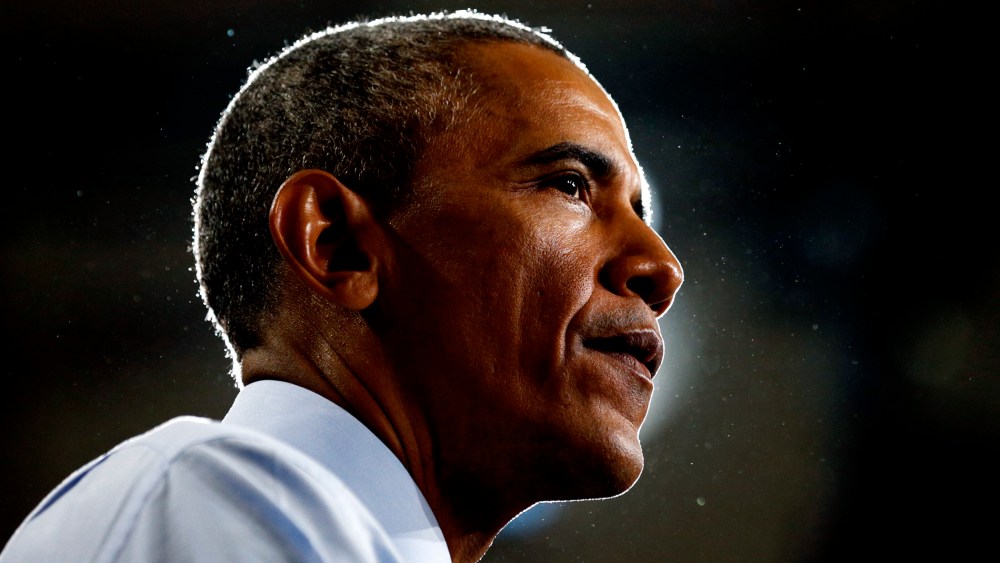 President Barack Obama pauses while speaking during a visit to the University of Kansas in Lawrence, Kansas, on Jan. 22, 2015. (Photo by Kevin Lamarque/Reuters)