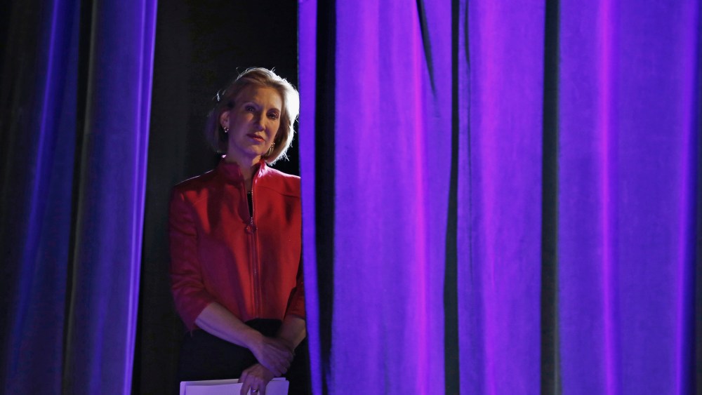 Former Hewlett-Packard Co Chief Executive Officer Carly Fiorina listens to her introduction from the side of the stage at the Freedom Summit in Des Moines, Ia., Jan. 24, 2015. (Photo by Jim Young/Reuters)