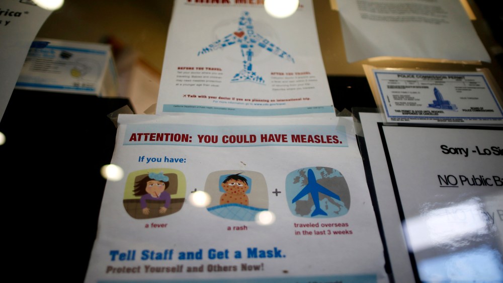 A measles poster at Venice Family Clinic in Los Angeles, Calif. Feb. 5, 2015. Lawmakers in several US states are backing proposals to make it harder for parents to opt out of school vaccinations based on personal beliefs. (Photo by Lucy Nicholson/Reuters)