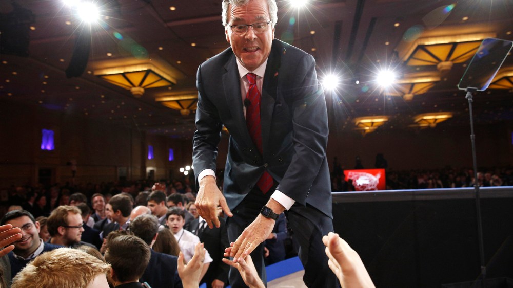 Jeb Bush shakes hands after speaking at the Conservative Political Action Conference (CPAC) at National Harbor in Maryland, on Feb. 27, 2015. (Photo by Kevin Lamarque/Reuters)