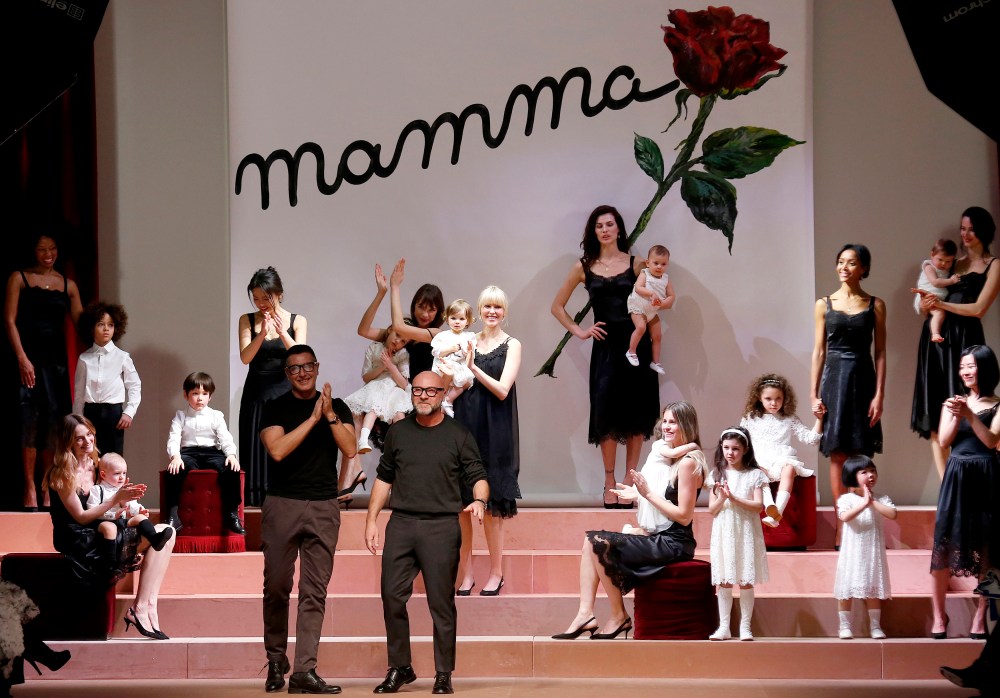 Italian designers Domenico Dolce and Stefano Gabbana acknowledge the audience at the end of their Autumn/Winter 2015/16 collection during Milan Fashion Week March 1, 2015. (Photo by Alessandro Bianchi/Reuters)