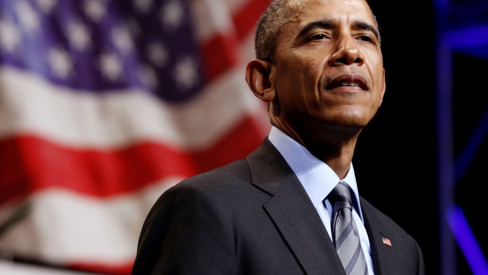 US President Barack Obama pauses as he makes remarks at the National League of Cities annual Congressional City Conference in Washington, March 9, 2015. (Photo by Jonathan Ernst/Reuters)