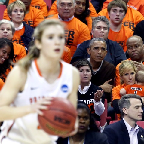 US President Barack Obama attends the game between Princeton and Green Bay for the 2015 Women's NCAA Basketball Tournament in College Park, Md., March 21, 2015. Obama's niece Leslie Robinson plays for Princeton. (Photo by Yuri Gripas/Reuters)
