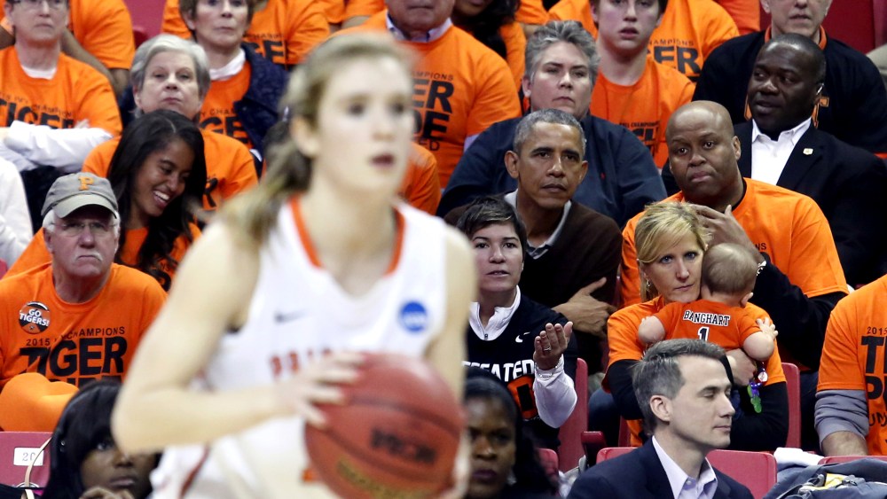 US President Barack Obama attends the game between Princeton and Green Bay for the 2015 Women's NCAA Basketball Tournament in College Park, Md., March 21, 2015. Obama's niece Leslie Robinson plays for Princeton. (Photo by Yuri Gripas/Reuters)