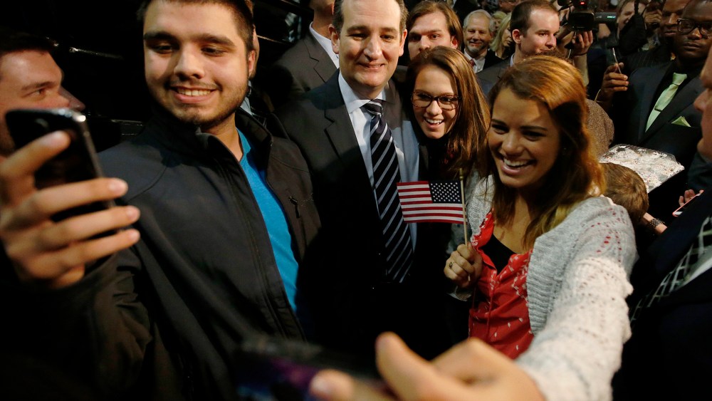 US Senator Ted Cruz (R-TX) poses for pictures with students shooting "selfies" after confirming his candidacy for the 2016 presidential election race during a speech at Liberty College in Lynchburg, Va., March 23, 2015. (Photo by Chris Keane/Reuters)