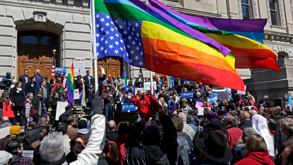 Demonstrators gather at Monument Circle to protest a controversial religious freedom bill recently signed by Governor Mike Pence, during a rally in Indianapolis March 28, 2015. (Photo by Nate Chute/Reuters)