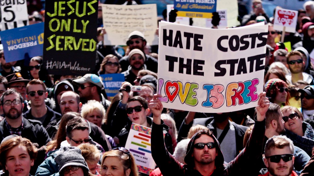 Demonstrators gather at Monument Circle to protest a controversial religious freedom bill recently signed by Governor Mike Pence, during a rally in Indianapolis March 28, 2015. (Photo by Nate Chute/Reuters)