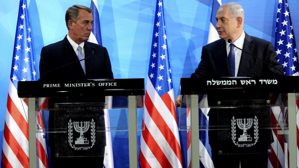 Israeli Prime Minister Benjamin Netanyahu looks at the Speaker of the US House of Representatives, John Boehner, as they deliver statements in Jerusalem April 1, 2015. (Photo by Debbie Hill/Reuters)