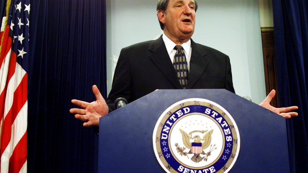 Senator Bob Smith talks to reporters in the U.S. Capitol, July 13, 1999.