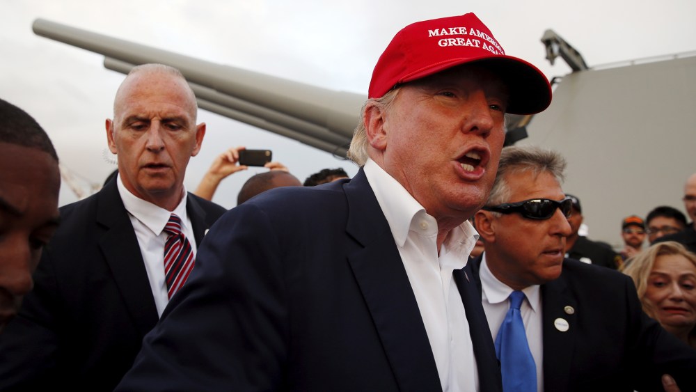 U.S. Republican presidential candidate Donald Trump walks past the guns of the USS Iowa after speaking on the battleship in San Pedro, Los Angeles, Calif., United States Sept. 15, 2015. (Photo by Lucy Nicholson/Reuters)