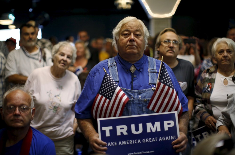 Supporters of U.S. Republican presidential candidate Donald Trump attend a campaign event in Waterloo, Ia., Oct. 7, 2015. (Photo by Jim Young/Reuters)