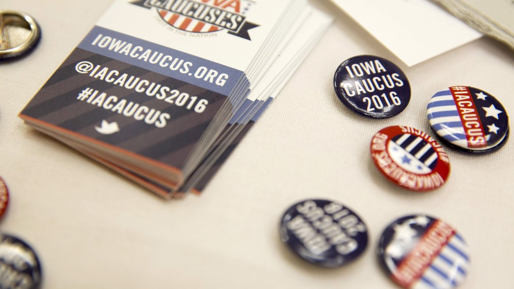 Buttons for visitors at the Greater Des Moines Partnership Iowa Caucus Consortium candidate forum are seen before a visit by U.S. Republican presidential candidate Jeb Bush in Des Moines, Ia., Oct. 8, 2015. (Photo by Scott Morgan/Reuters)