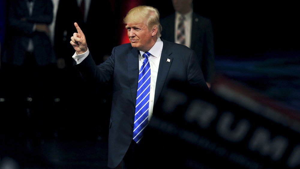 U.S. Republican Presidential candidate Donald Trump gestures as he greets the audience after speaking at a rally in Las Vegas, Nev., Oct. 8, 2015. (Photo by David Becker/Reuters)