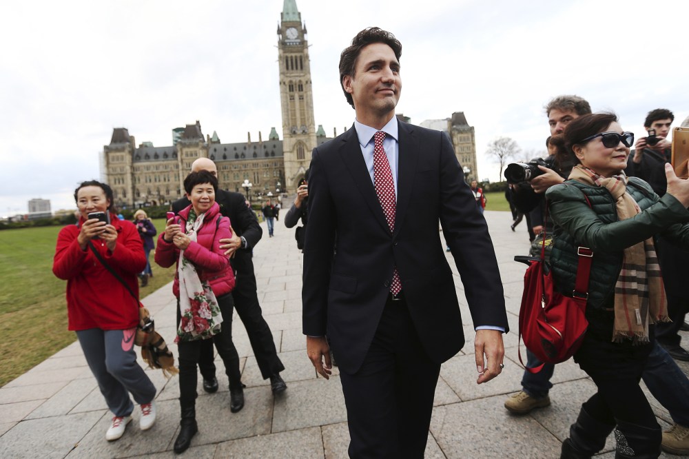 Canada's Liberal leader and Prime Minister-designate Justin Trudeau walks on Parliament Hill in Ottawa, Ontario, Oct. 20, 2015. (Photo by Chris Wattie/Reuters)
