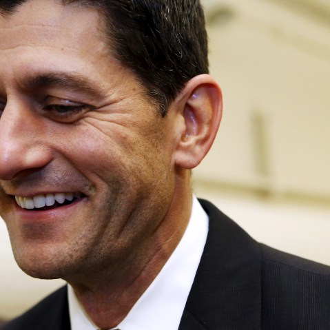 U.S. Representative Paul Ryan (R-WI) smiles as he walks at the end of the day of the House Freedom Caucus meeting on Capitol Hill in Washington Oct. 21, 2015. (Photo by Yuri Gripas/Reuters)