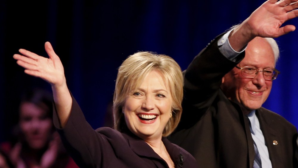 Democratic presidential candidates Hillary Clinton and Bernie Sanders wave following the First in the South Presidential Candidates Forum held at Winthrop University in Rock Hill, S.C. on Nov. 6, 2015. (Photo by Chris Keane/Reuters)