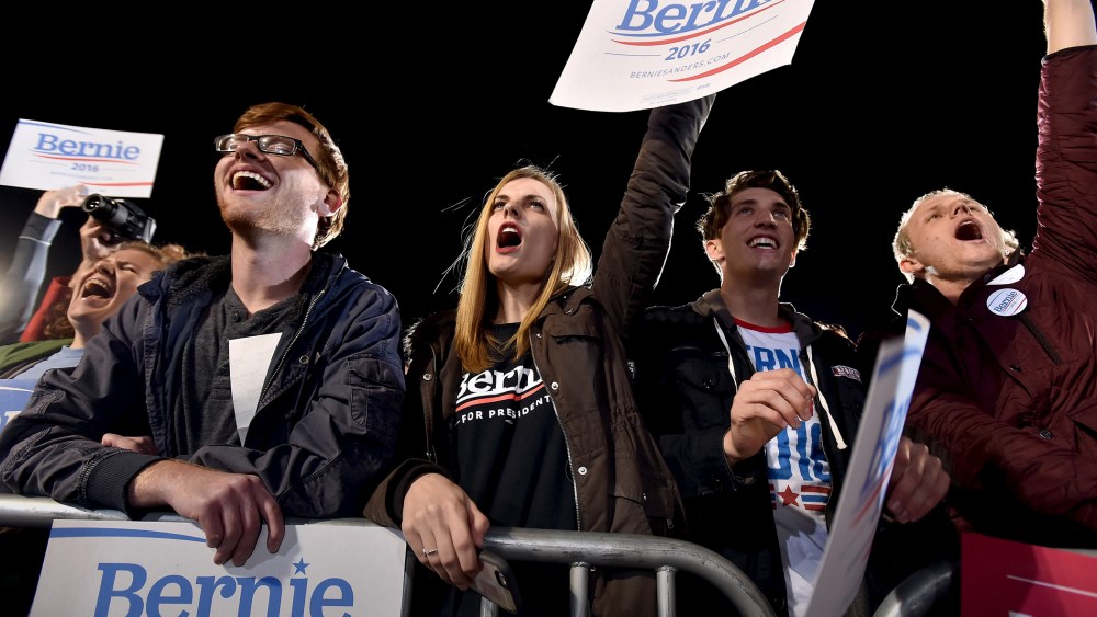 Supporters of U.S. Democratic presidential candidate Senator Bernie Sanders cheer as he speaks at a rally in North Las Vegas, Nev., Nov. 8, 2015. (Photo by David Becker/Reuters)