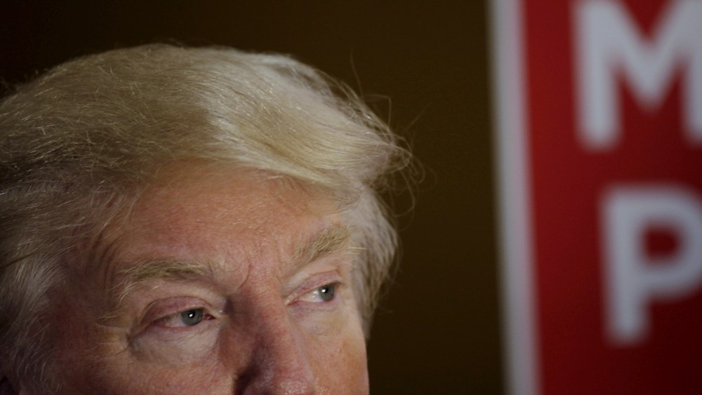 Republican Presidential candidates Donald Trump takes interviews in the spin room after the debate held by Fox Business Network for the top 2016 U.S. Republican candidates in Milwaukee, Wis., Nov. 10, 2015. (Photo by Darren Hauck/Reuters)