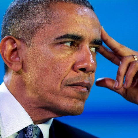 U.S. President Barack Obama listens closely during the APEC CEO Summit in Manila, Philippines, Nov. 18, 2015. (Photo by Jonathan Ernst/Reuters)