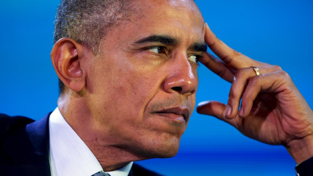 U.S. President Barack Obama listens closely during the APEC CEO Summit in Manila, Philippines, Nov. 18, 2015. (Photo by Jonathan Ernst/Reuters)