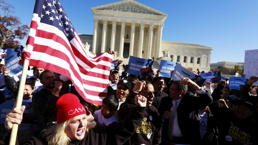 Immigrants and community leaders rally in front of the U.S. Supreme Court to mark the one-year anniversary of President Barack Obama's executive orders on immigration in Washington, Nov. 20, 2015. (Photo by Kevin Lamarque/Reuters)
