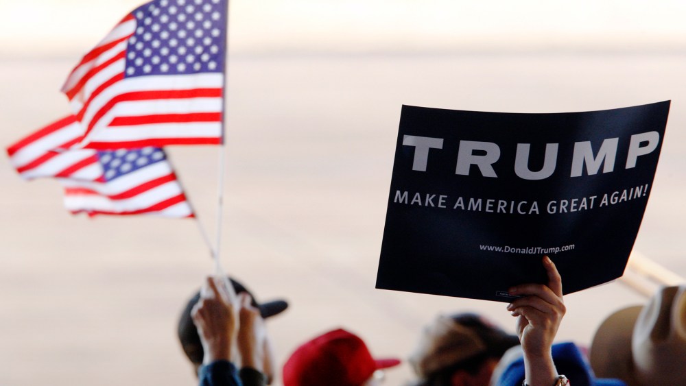 Supporters greet Republican presidential candidate Donald Trump at a rally during a campaign stop at the airport in Millington, Tenn., Feb. 27, 2016. (Photo by Karen Pulfer Focht/Reuters)